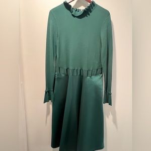 Classic dress. Like new wore once to a wedding. Great party dress.